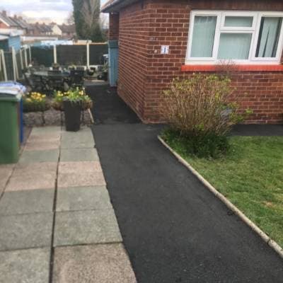 Before and after of block paving cleaned by Sparkle Jetwash