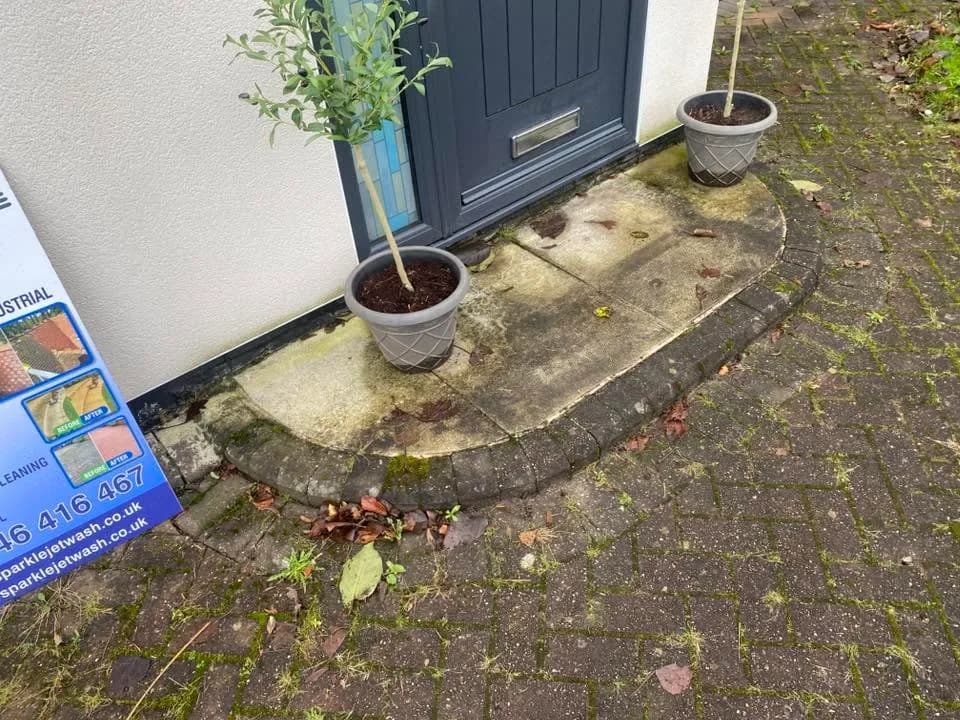 Weathered garden patio before exterior cleaning